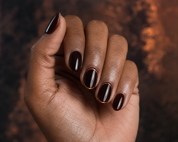 Short espresso jelly gel nails with a thin copper halo