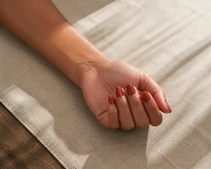 Burnt rust gel nails with fine copper line detail