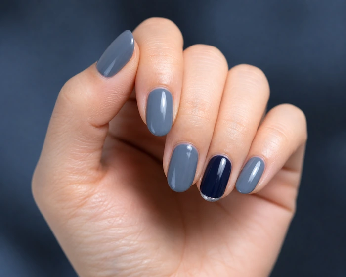 Slate blue simple winter nails with subtle silver tip