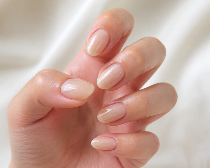 Subtle glass-fleck shimmer soft fall nails
