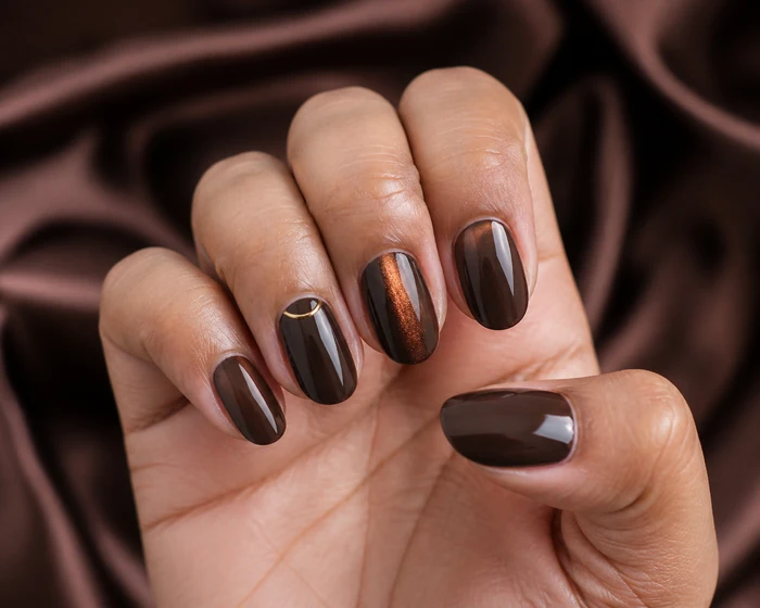 Espresso cat-eye Thanksgiving gel nails with gold half moon