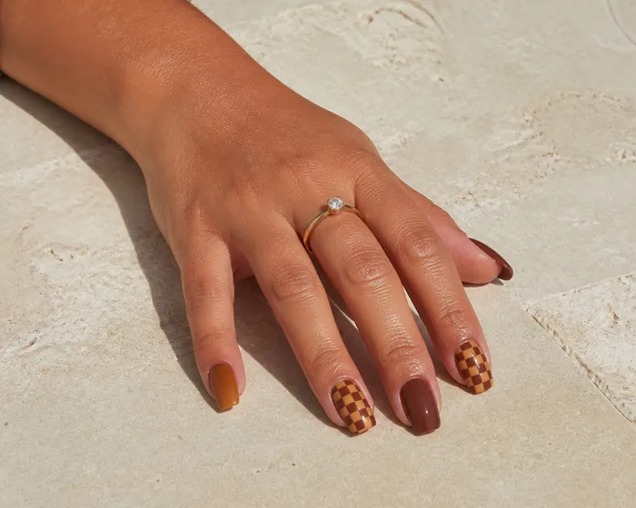 Brown and caramel checker fall nail art