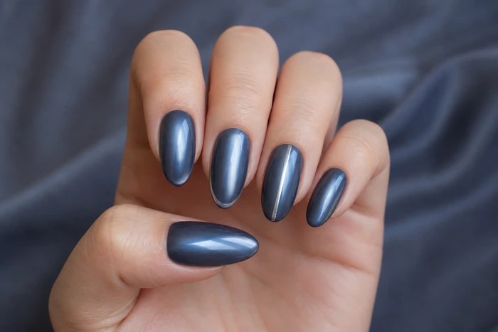 Long smoky blue chrome almond nails with pewter line