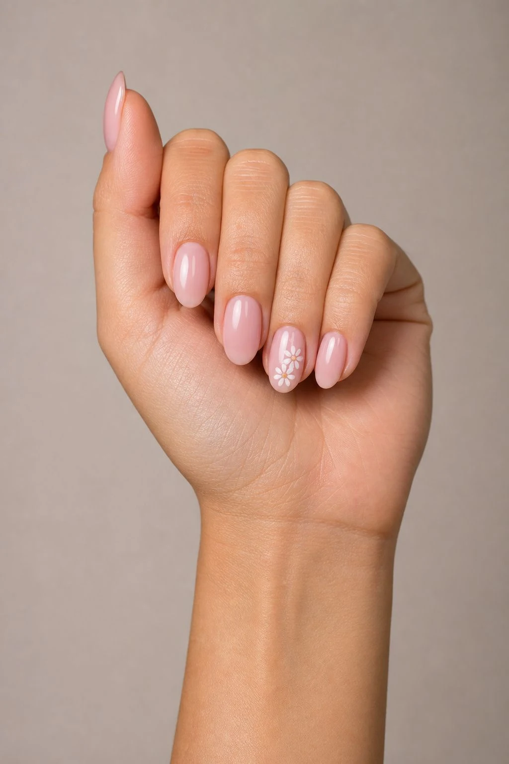 Blush Floral Accent Nails in a curled hand pose with thumb clearly separated