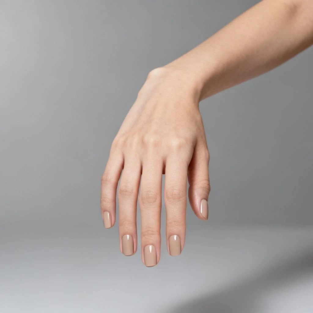Glossy neutral strengthening overlay on healthy natural nails.