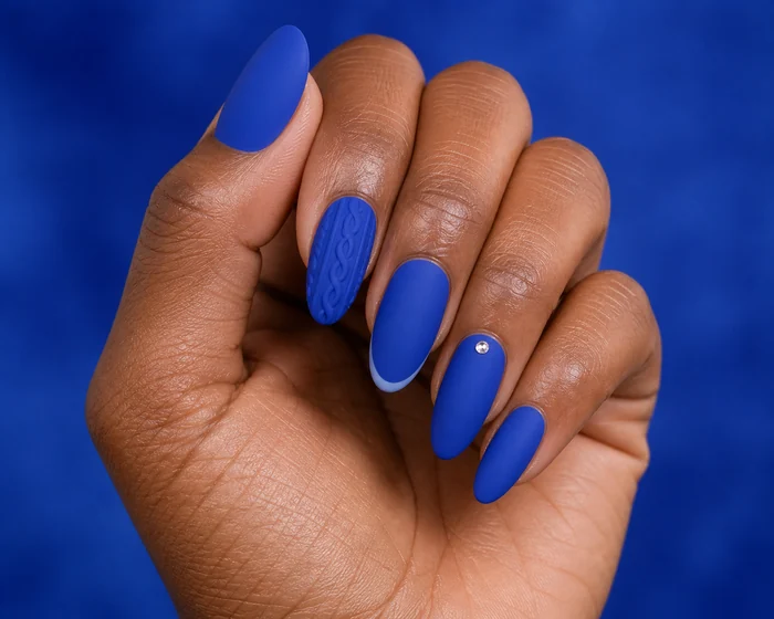 Matte cobalt sweater nails with cable texture and pale blue micro French tips