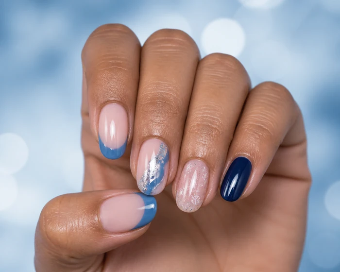 French blue winter nails with silver foil wave and navy accent