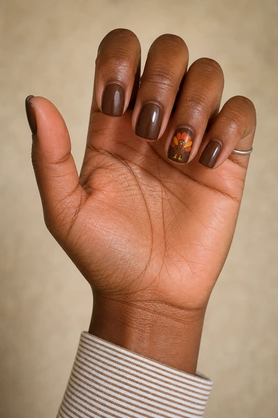 Minimal warm nude turkey line art on short square nails, glossy relaxed hand pose, medium skin tone