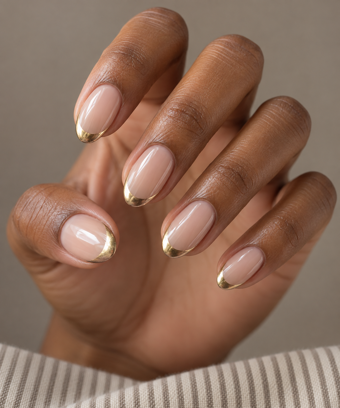 Gold French tip nails